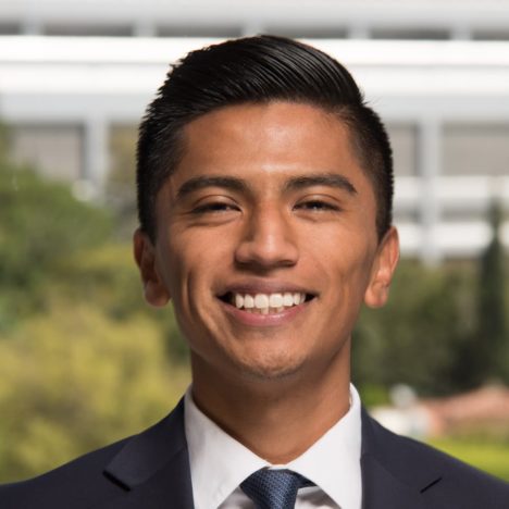 Carlos in dark suit