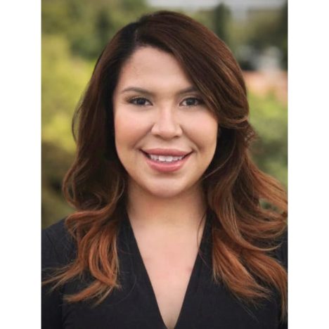 Karla wearing a dark suit