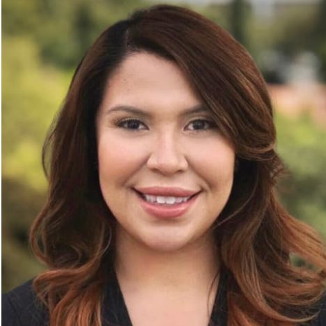Karla wearing a dark suit
