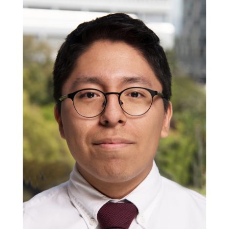 Kevin with maroon tie and glasses