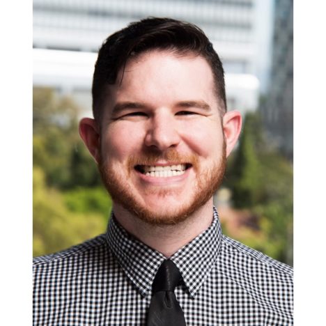 Kyle with a black and white checked shirt