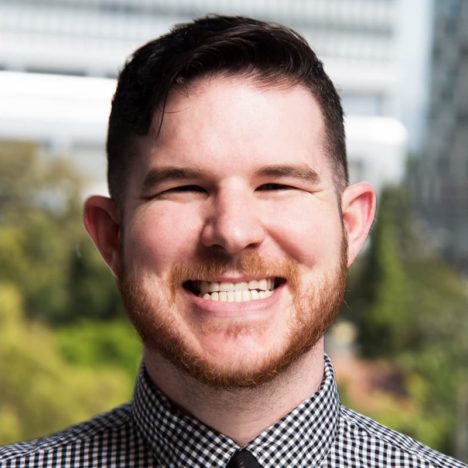 Kyle with a black and white checked shirt