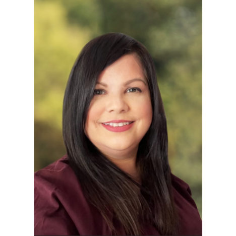Woman wearing maroon blouse
