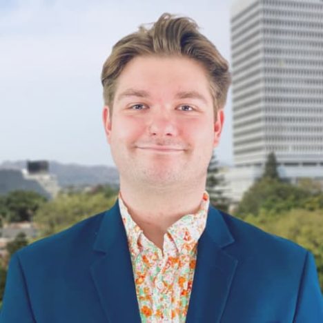Will in a flowered orange shirt